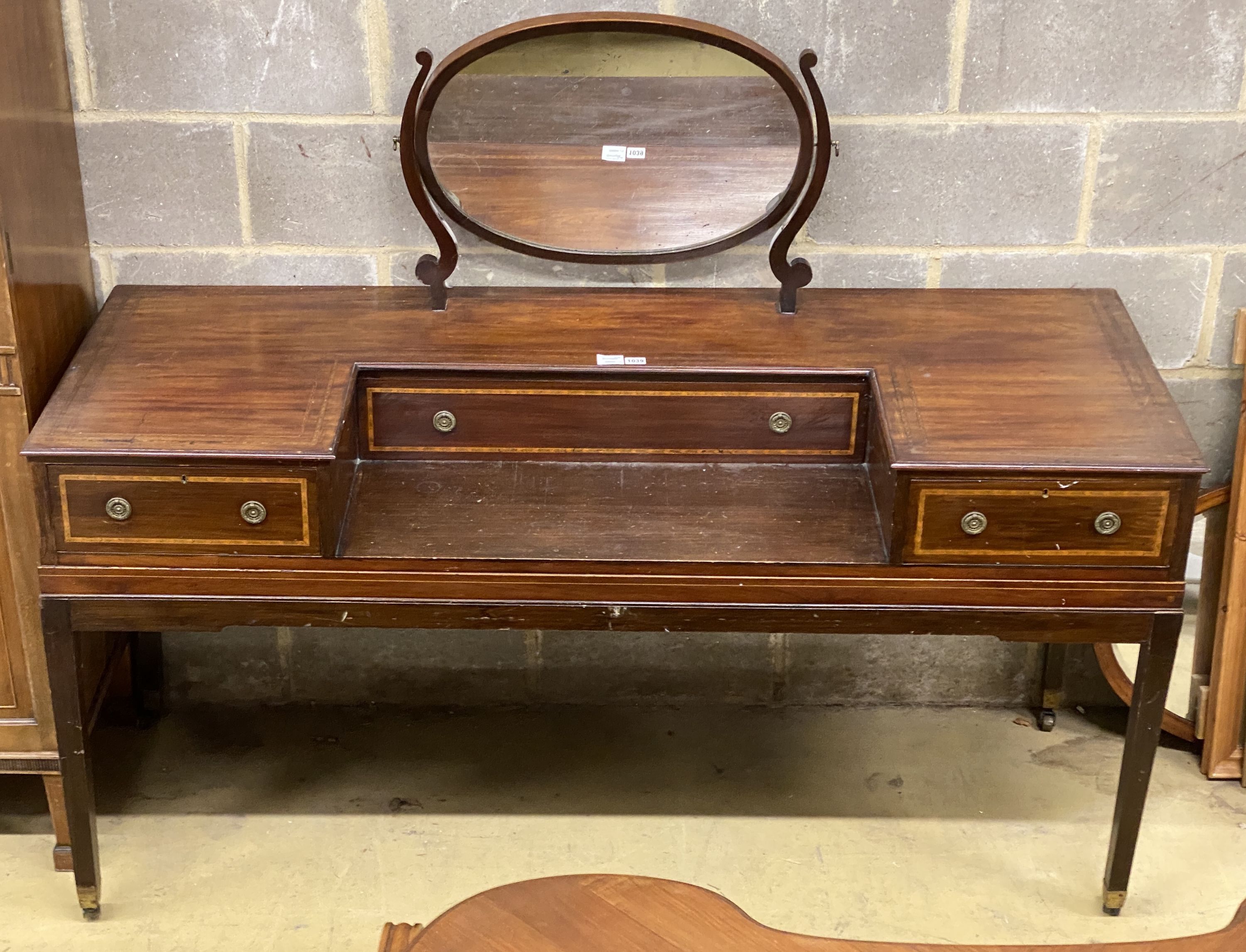 A mid 19th century mahogany dressing table,